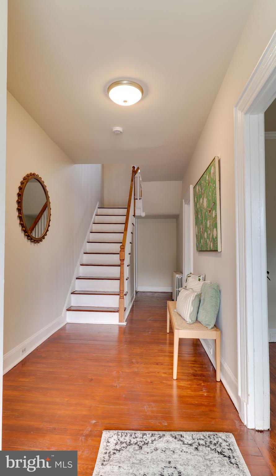 161 Warren Street Beverly, NJ 08010 - Photo 4 of 31 a living room with furniture and a rug