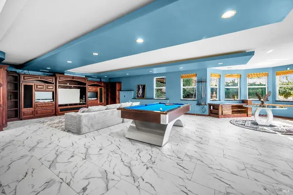 a view of room with wooden floor