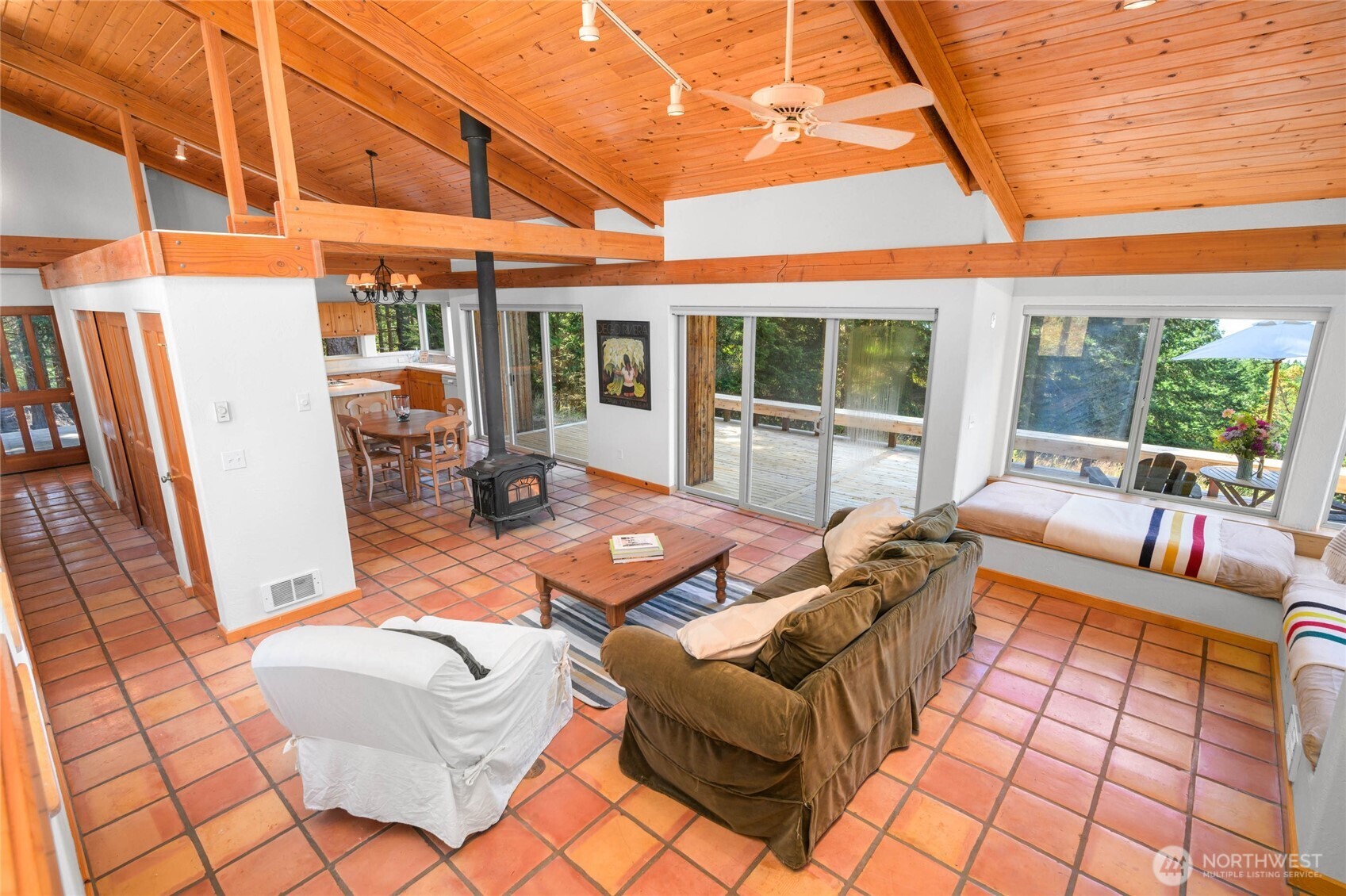 177 Harmon Ranch Hill Road Decatur Island, WA 98221 - Photo 13 of 37 a outdoor living space with patio furniture and a potted plant