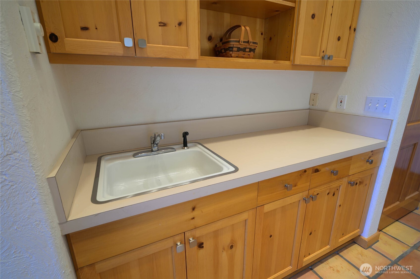 177 Harmon Ranch Hill Road Decatur Island, WA 98221 - Photo 16 of 37 a bathroom with a sink and cabinets
