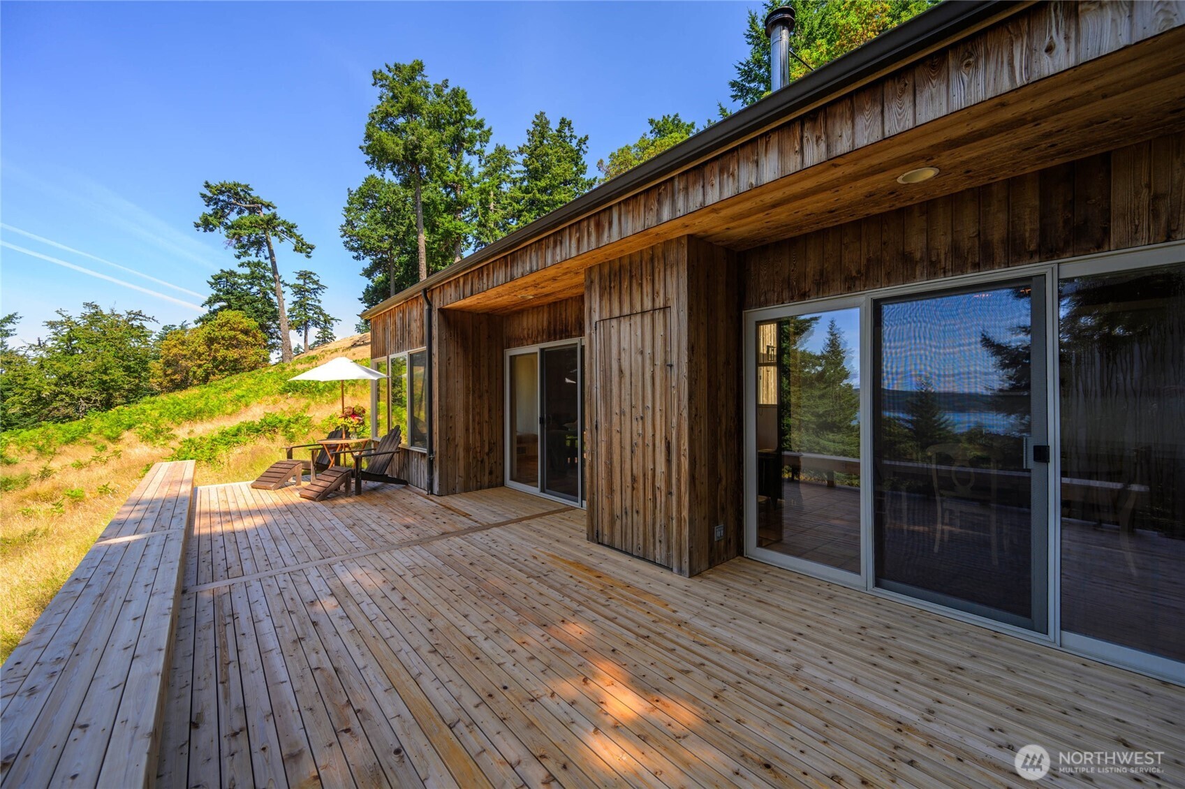 177 Harmon Ranch Hill Road Decatur Island, WA 98221 - Photo 18 of 37 a view of a house with backyard and porch