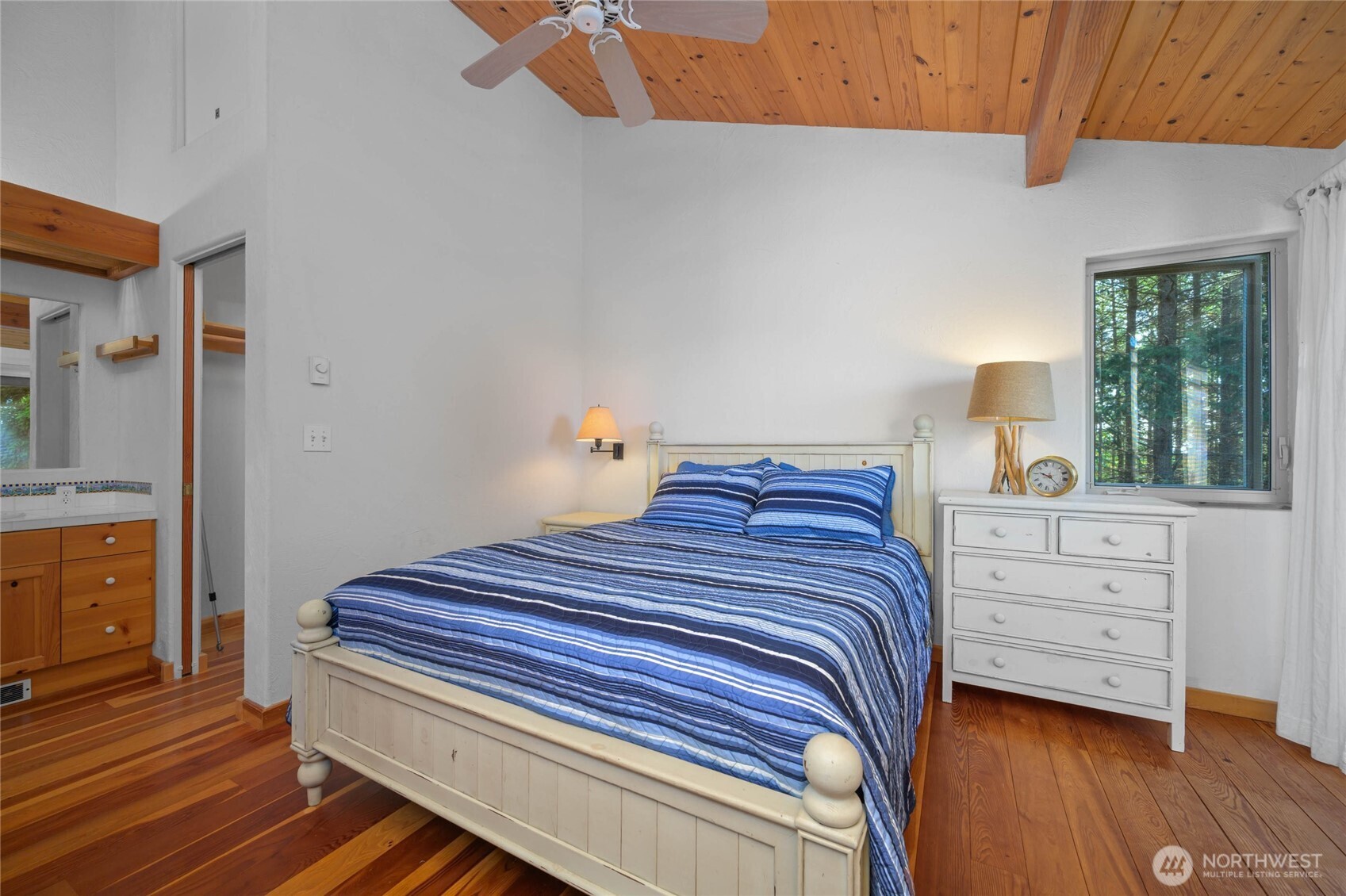 177 Harmon Ranch Hill Road Decatur Island, WA 98221 - Photo 24 of 37 a bedroom with a bed and a window