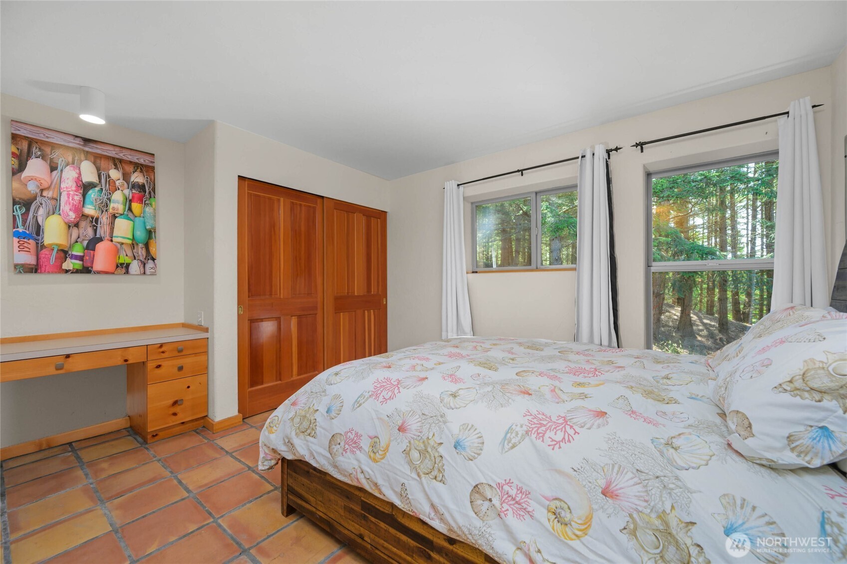 177 Harmon Ranch Hill Road Decatur Island, WA 98221 - Photo 29 of 37 a bedroom with a bed and a window
