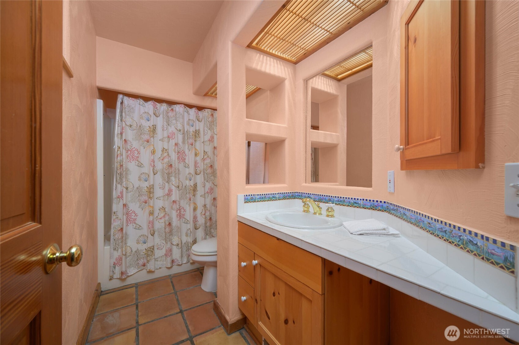 177 Harmon Ranch Hill Road Decatur Island, WA 98221 - Photo 30 of 37 a bathroom with a sink and a mirror