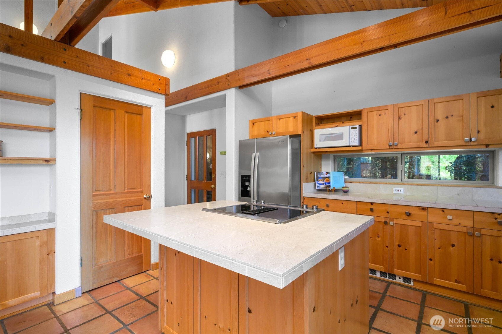 177 Harmon Ranch Hill Road Decatur Island, WA 98221 - Photo 3 of 37 a kitchen with stainless steel appliances a stove a sink and a refrigerator