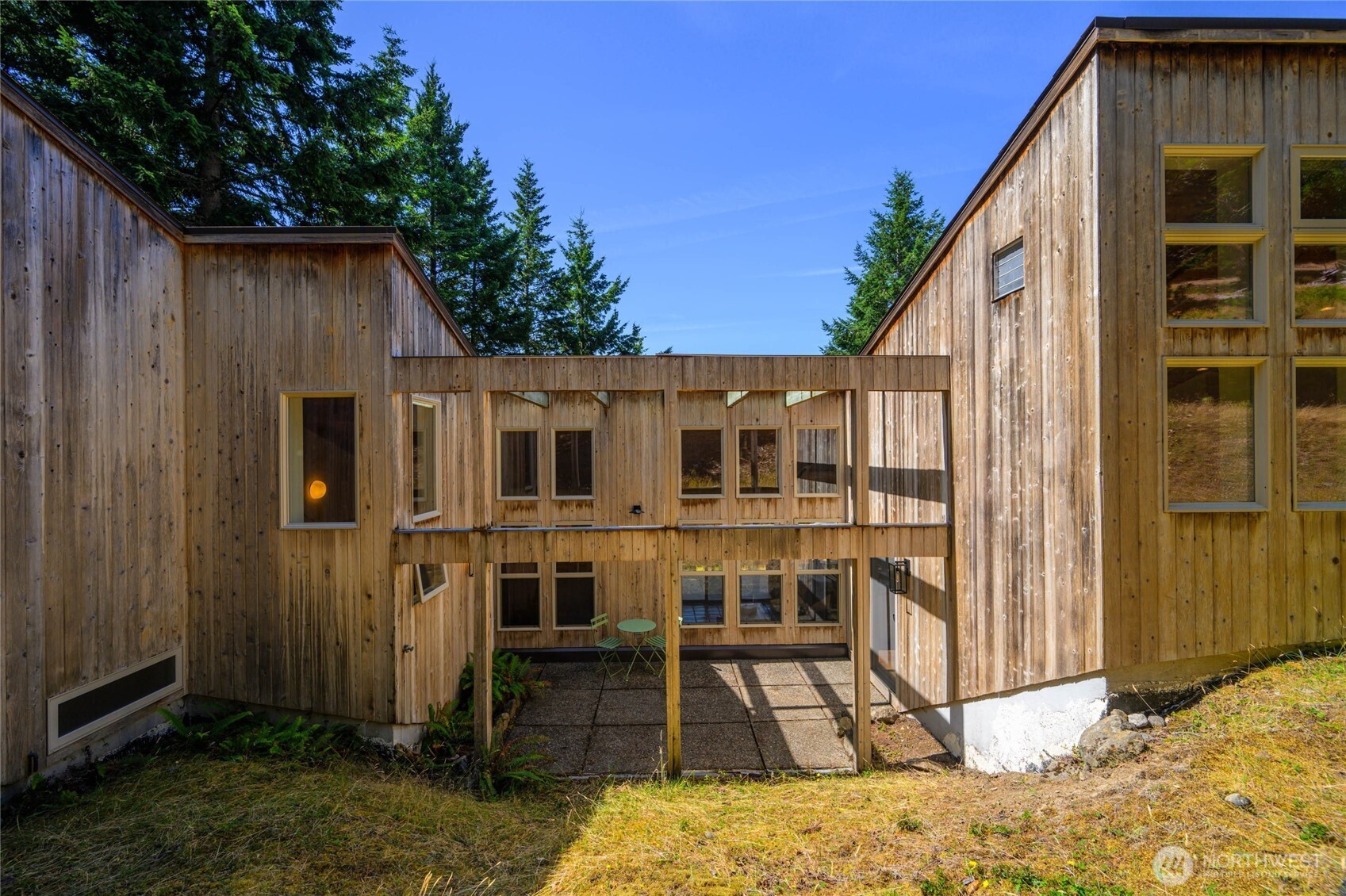 177 Harmon Ranch Hill Road Decatur Island, WA 98221 - Photo 32 of 37 a view of a house with backyard and porch