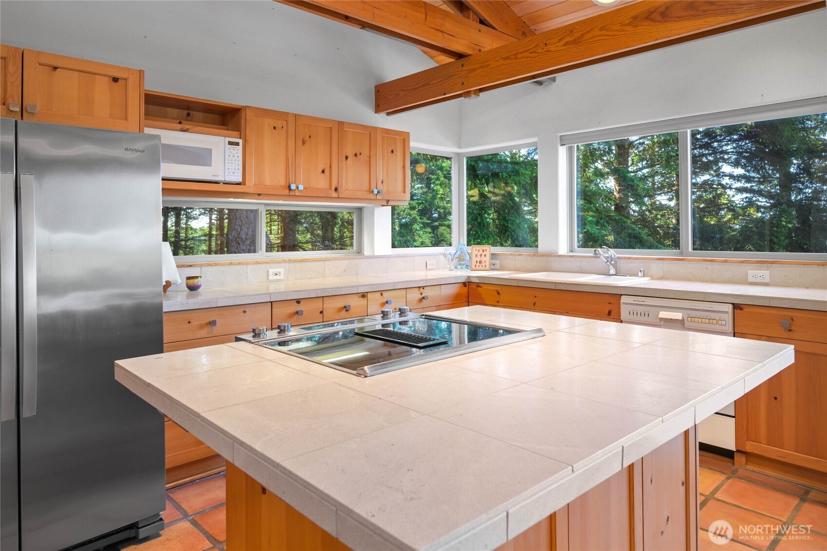 177 Harmon Ranch Hill Road Decatur Island, WA 98221 - Photo 4 of 37 a kitchen with stainless steel appliances granite countertop a sink and a refrigerator