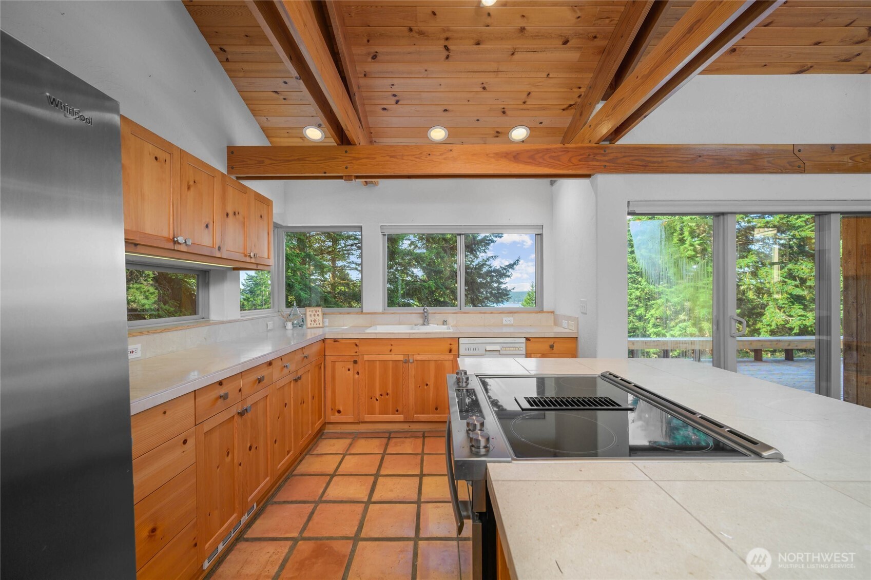177 Harmon Ranch Hill Road Decatur Island, WA 98221 - Photo 5 of 37 a kitchen with stainless steel appliances lots of counter top space