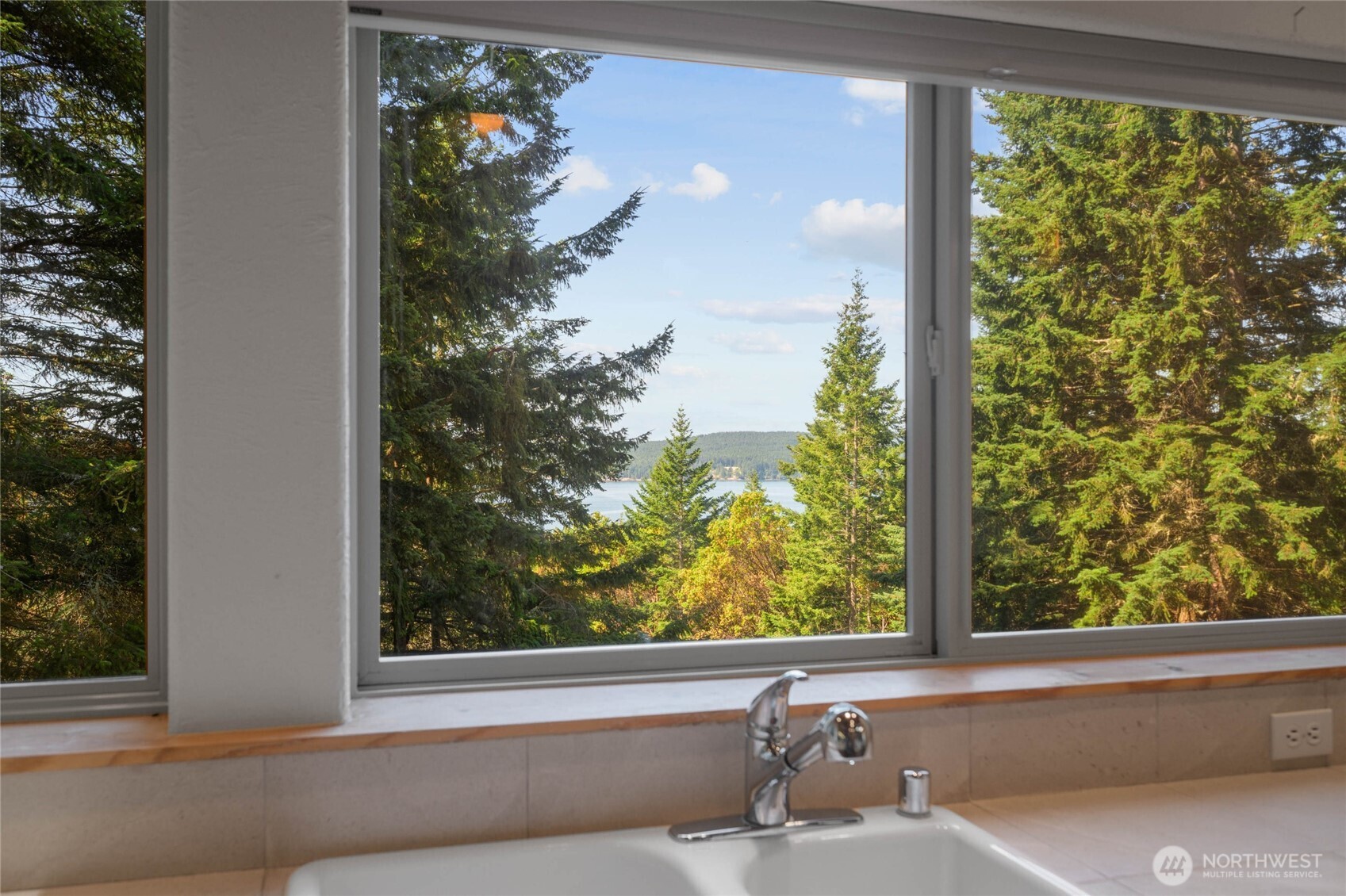 177 Harmon Ranch Hill Road Decatur Island, WA 98221 - Photo 6 of 37 a view of a window in a room