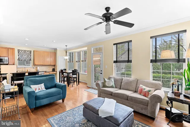 a bathroom with a sink toilet and a mirror