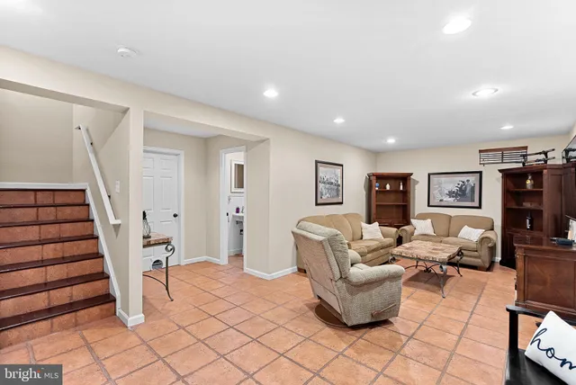 a living room with furniture and a couch