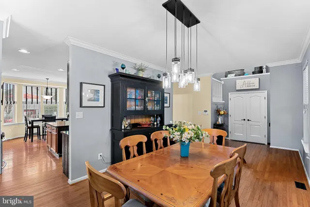 a kitchen with lots of counter top space and stainless steel appliances