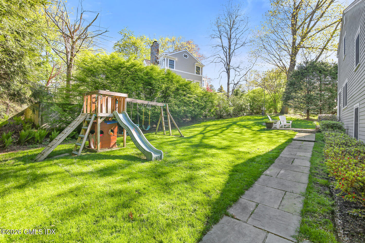 29 Coventry Lane Riverside, CT 06878 - Photo 16 of 20 a view of a backyard with a small house