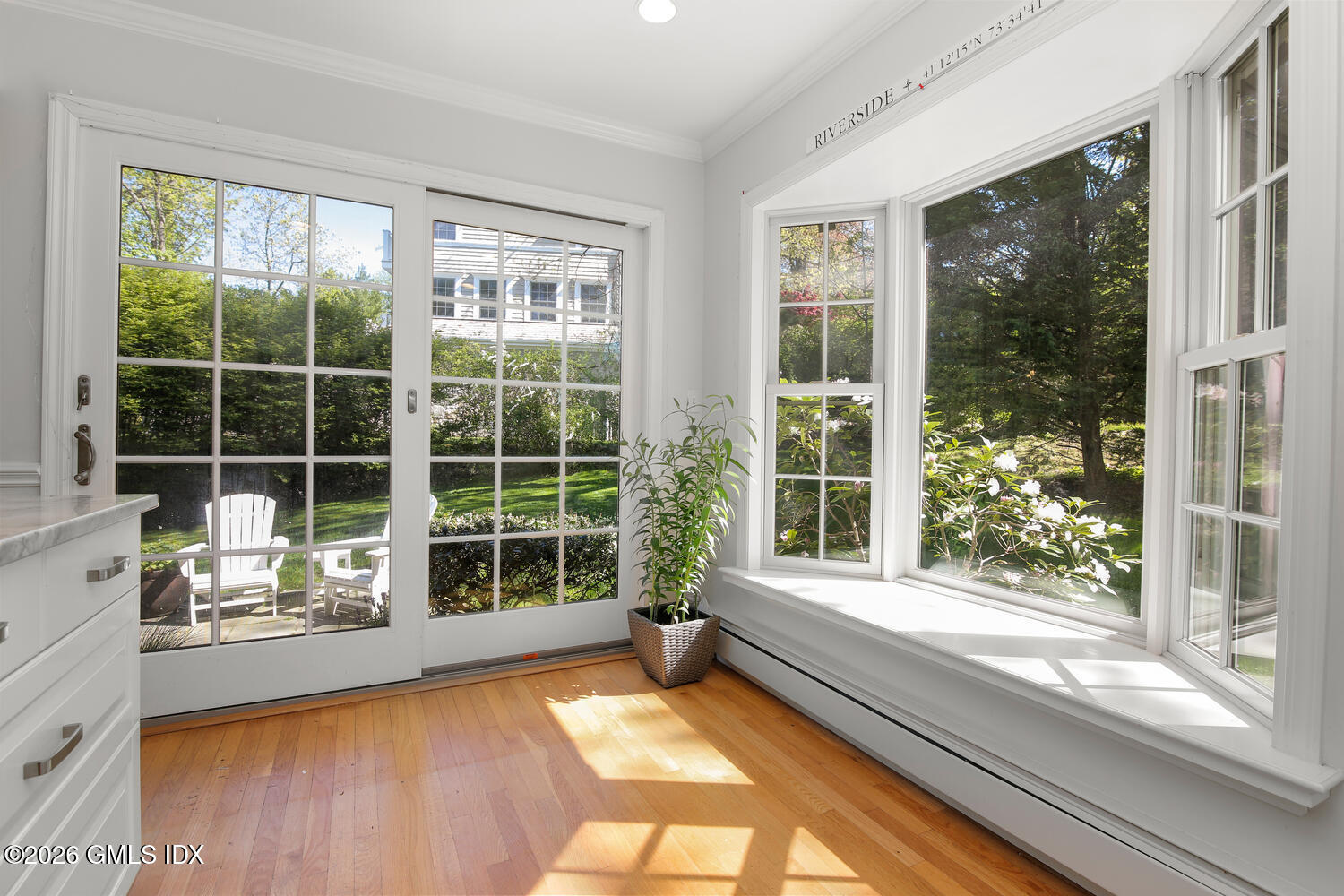 29 Coventry Lane Riverside, CT 06878 - Photo 5 of 20 a view of a large window with a floor to ceiling window