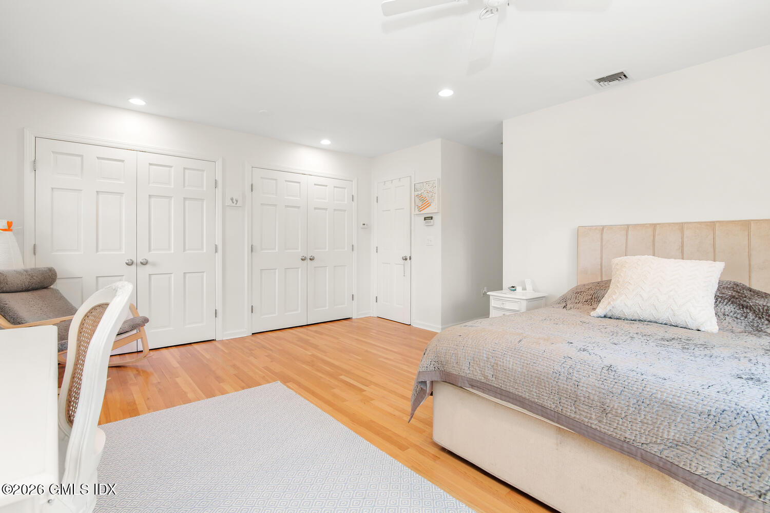 29 Coventry Lane Riverside, CT 06878 - Photo 7 of 20 a bedroom with a bed and a couch