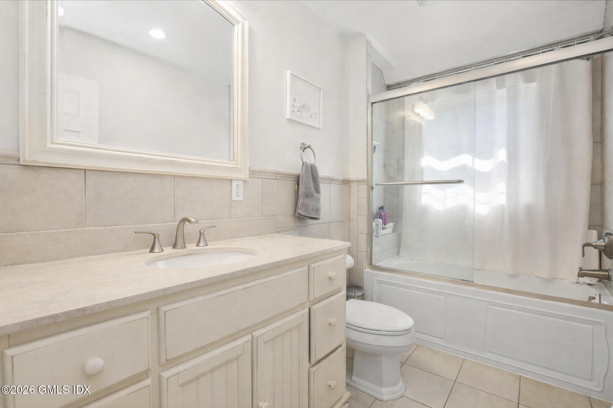 29 Coventry Lane Riverside, CT 06878 - Photo 8 of 20 a bathroom with a sink a toilet and shower