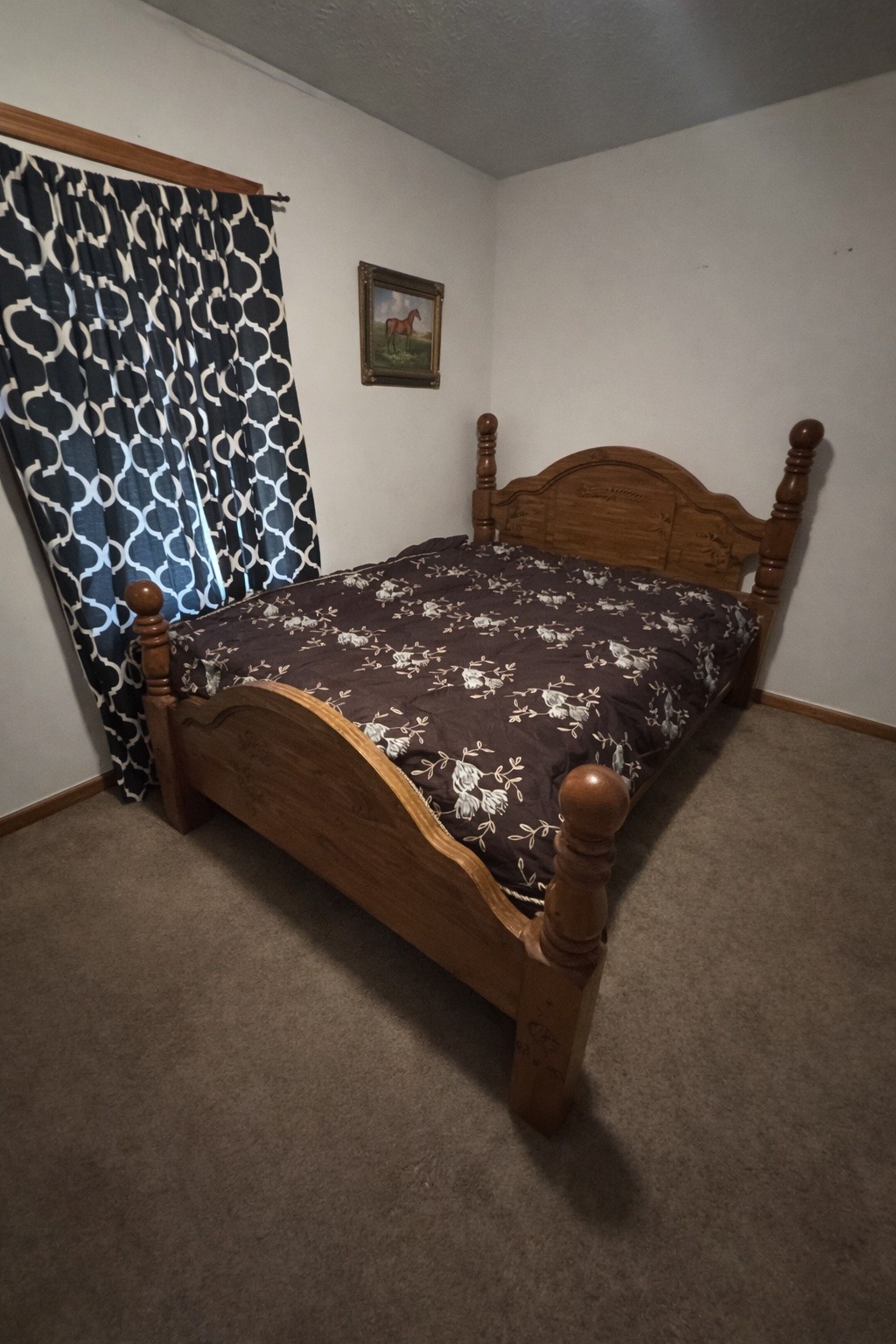 2813 She Boss Road Duck River, TN 38454 - Photo 16 of 21 a bed sitting in a bedroom next to a window