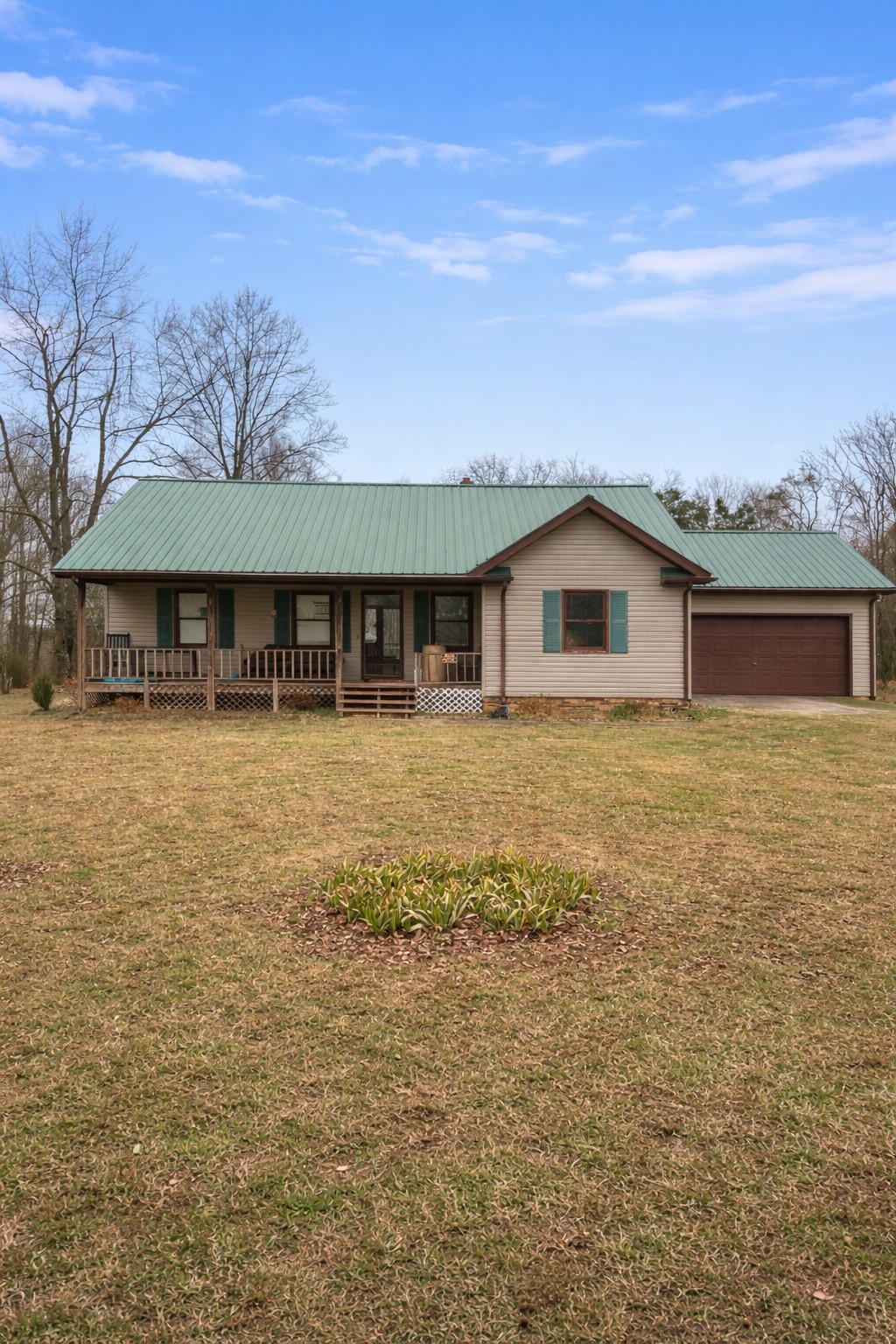 2813 She Boss Road Duck River, TN 38454 - Photo 8 of 21 a front view of a house with a yard