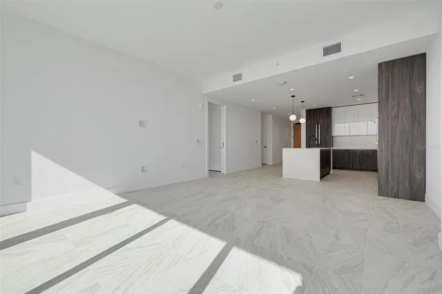 a view of a hallway with a furniture
