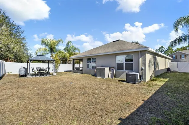 a view of a house with a patio