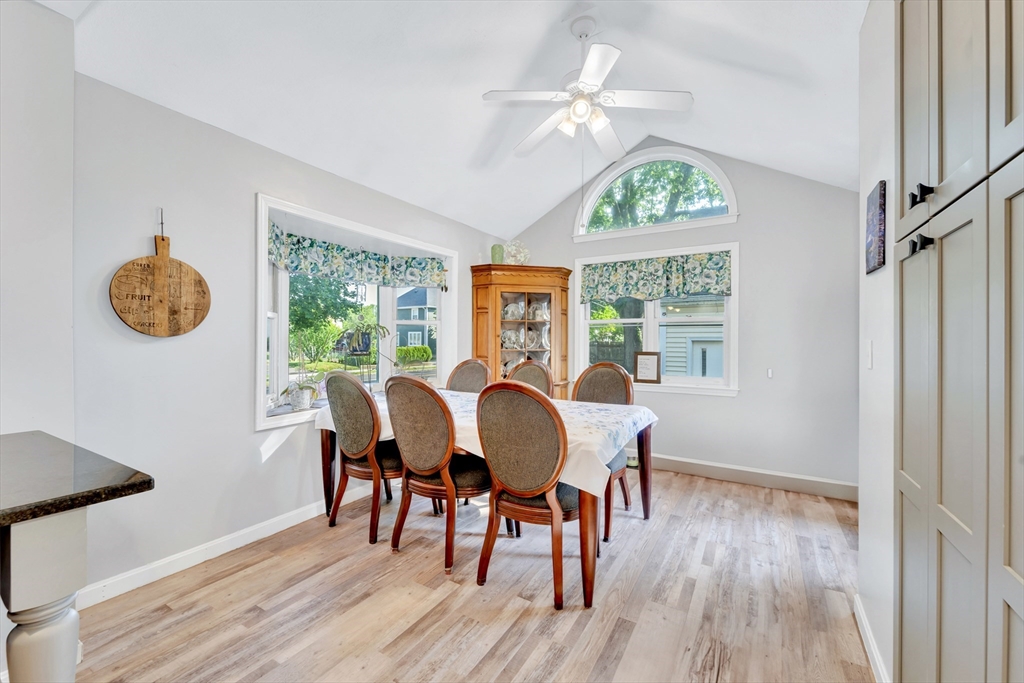 4 Rebecca Road Newton, MA 02465 - Photo 11 of 39 a view of a dining room with furniture window and wooden floor