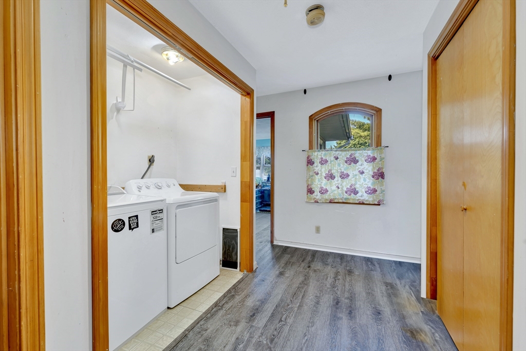 4 Rebecca Road Newton, MA 02465 - Photo 18 of 39 a view of utility room with wooden floor