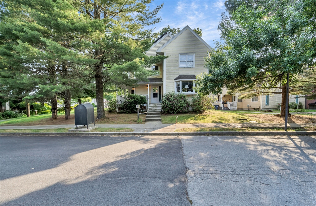 4 Rebecca Road Newton, MA 02465 - Photo 2 of 39 a view of a house with a yard and large trees