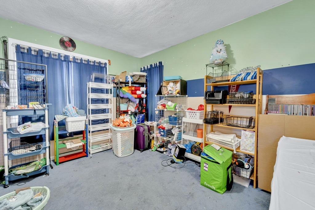 4 Rebecca Road Newton, MA 02465 - Photo 24 of 39 a room with storage and utility