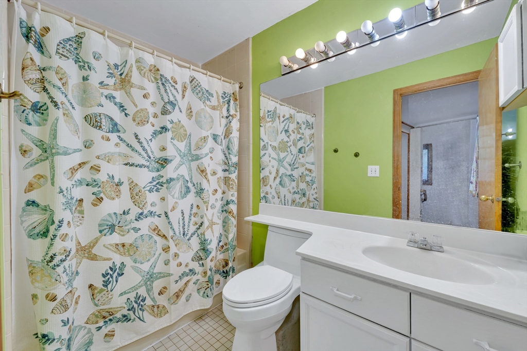 4 Rebecca Road Newton, MA 02465 - Photo 27 of 39 a bathroom with a toilet sink and mirror