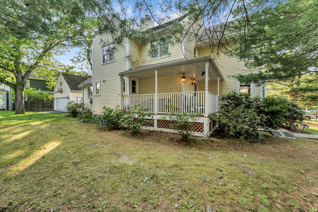 4 Rebecca Road Newton, MA 02465 - Photo 3 of 39 front view of a house with a garden