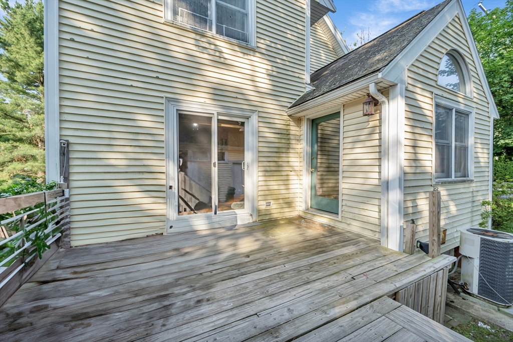 4 Rebecca Road Newton, MA 02465 - Photo 33 of 39 a view of a house with wooden deck