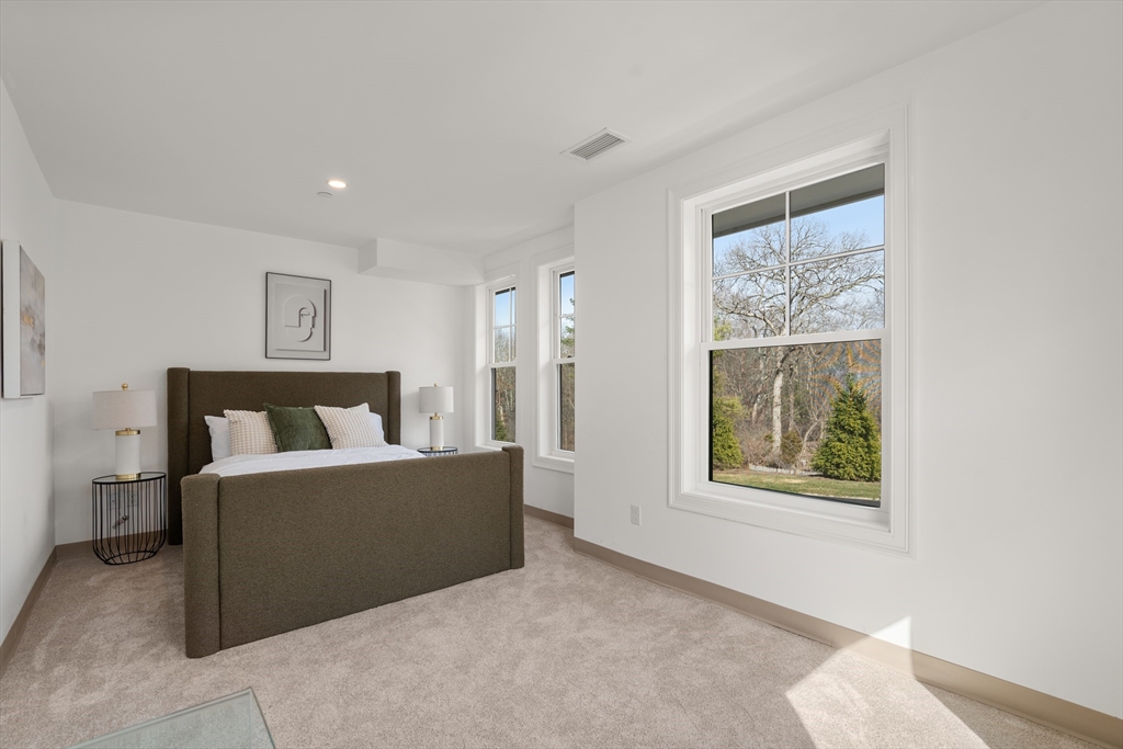 26 Union Street, Unit 110 Natick, MA 01760 - Photo 5 of 6 a living room with furniture and a window