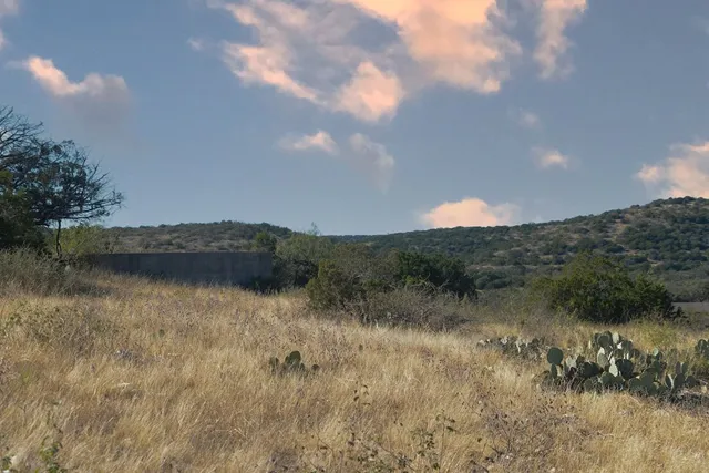 a view of a lake in between of a house