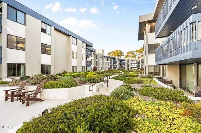 a view of a house with a swimming pool