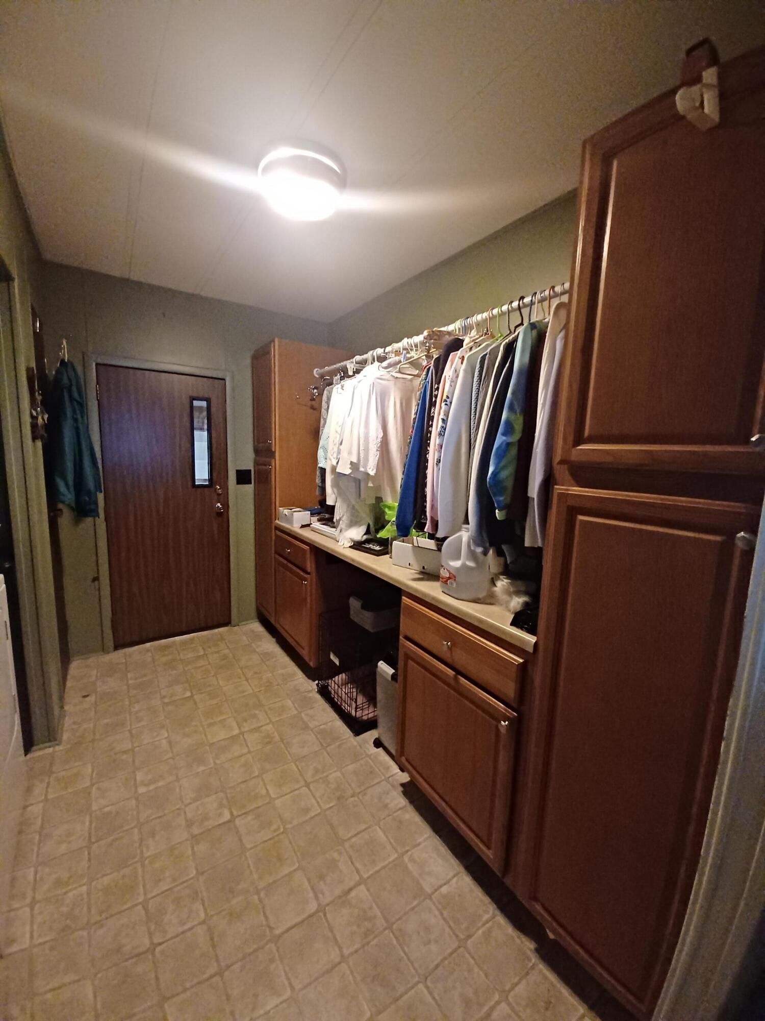 3200 Smeltzer Road, Unit 48 Marion, OH 43302 - Photo 19 of 19 laundry area for folding and hanging clothes and pantry