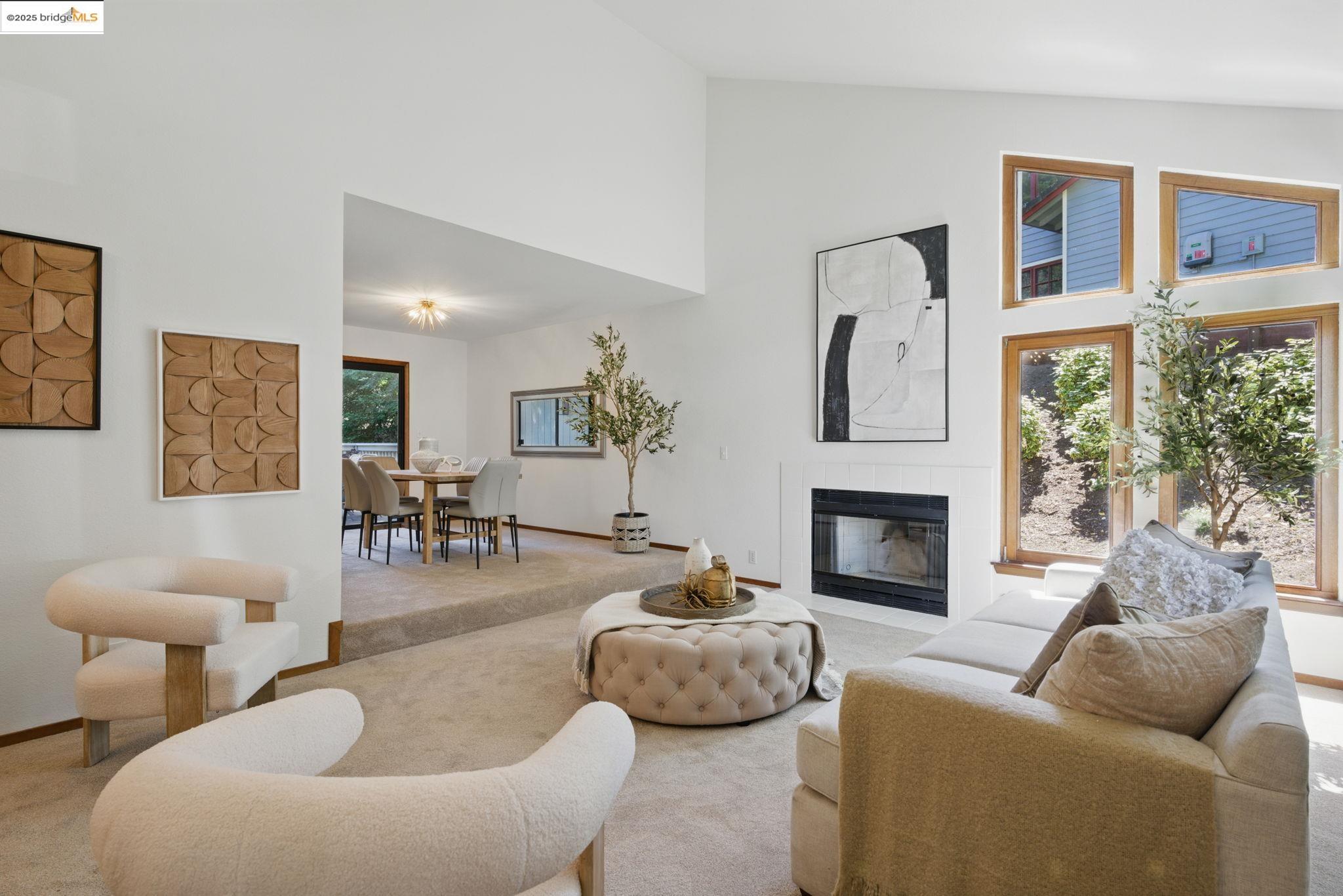 17 Vía Barcelona Moraga, CA 94556 - Photo 1 of 1 a living room with furniture and a fireplace