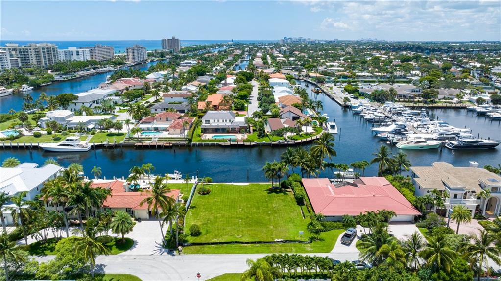 3020 Northeast 44th Street Lighthouse Point, FL 33064 - Photo 11 of 11 an aerial view of residential houses with outdoor space and lake view