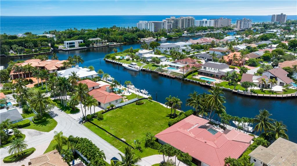 3020 Northeast 44th Street Lighthouse Point, FL 33064 - Photo 4 of 11 an aerial view of a house with a lake view
