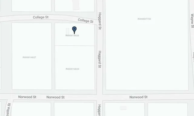 a utility room with a window and a picture