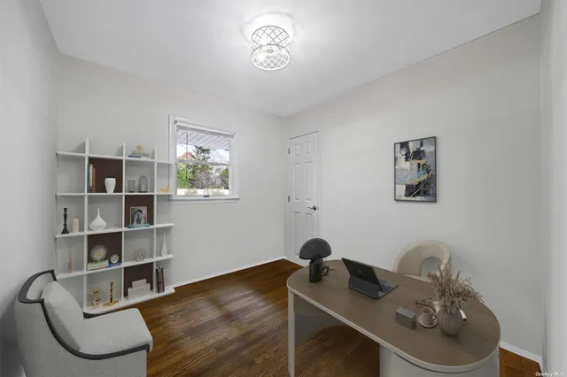 a workspace with furniture and window