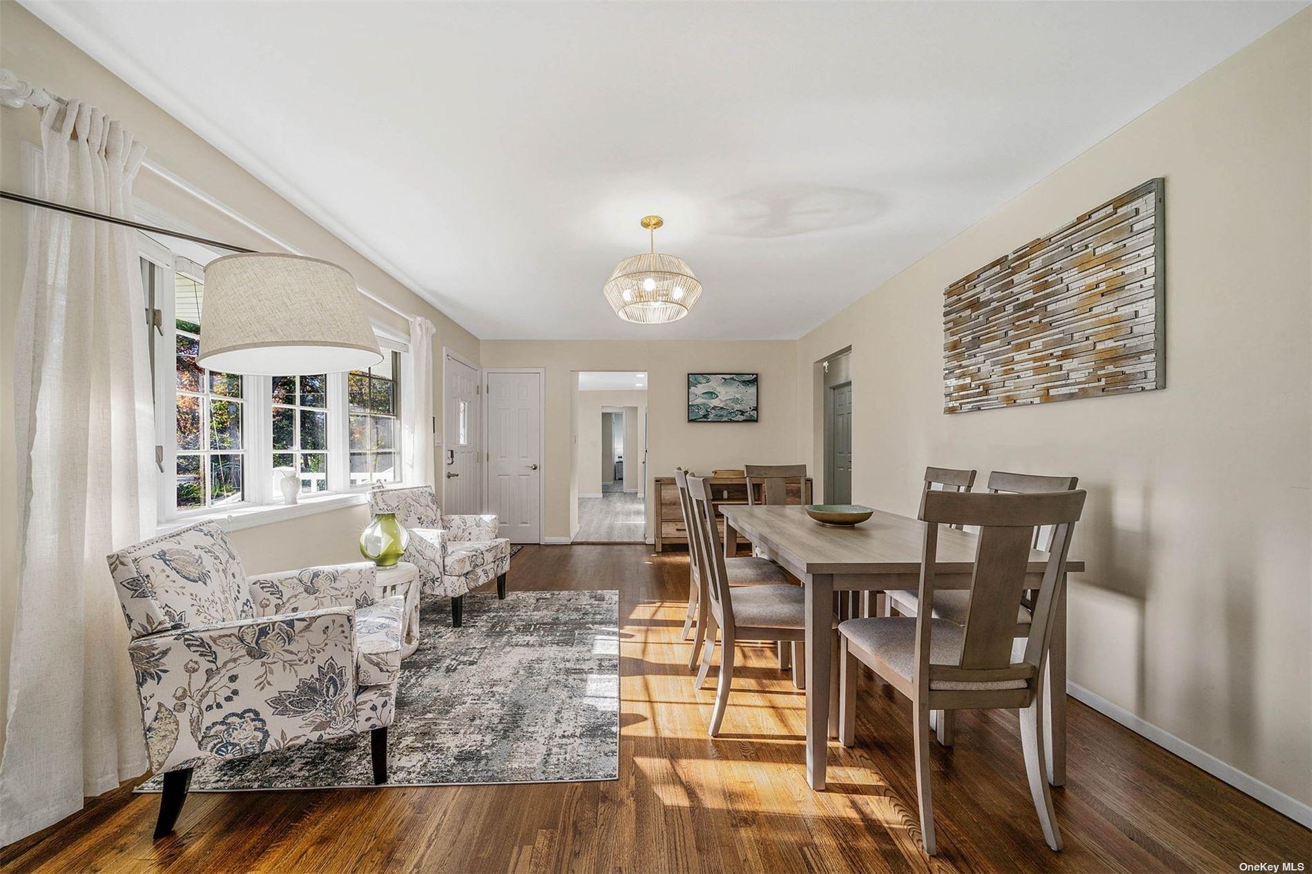 6 Rolling Hill Road Hampton Bays, NY 11946 - Photo 3 of 28 a view of a dining room with furniture
