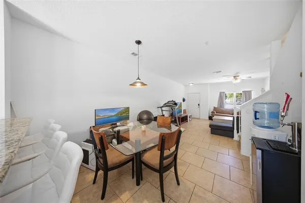 a view of a dining room with furniture