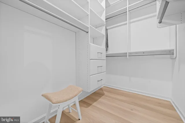 a view of a room with racks on the wall