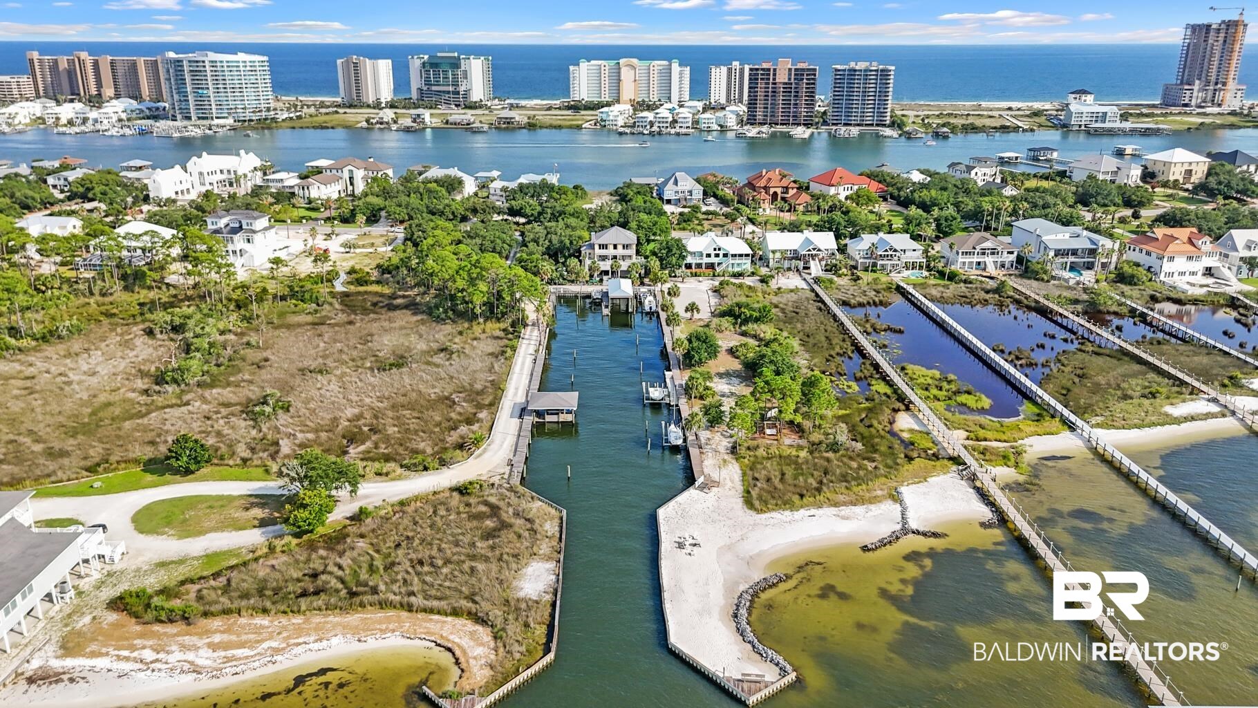 29255 Ono Boulevard Orange Beach, AL 36561 - Photo 7 of 43 Aerial view of property and surrounding area featuring a large body of water