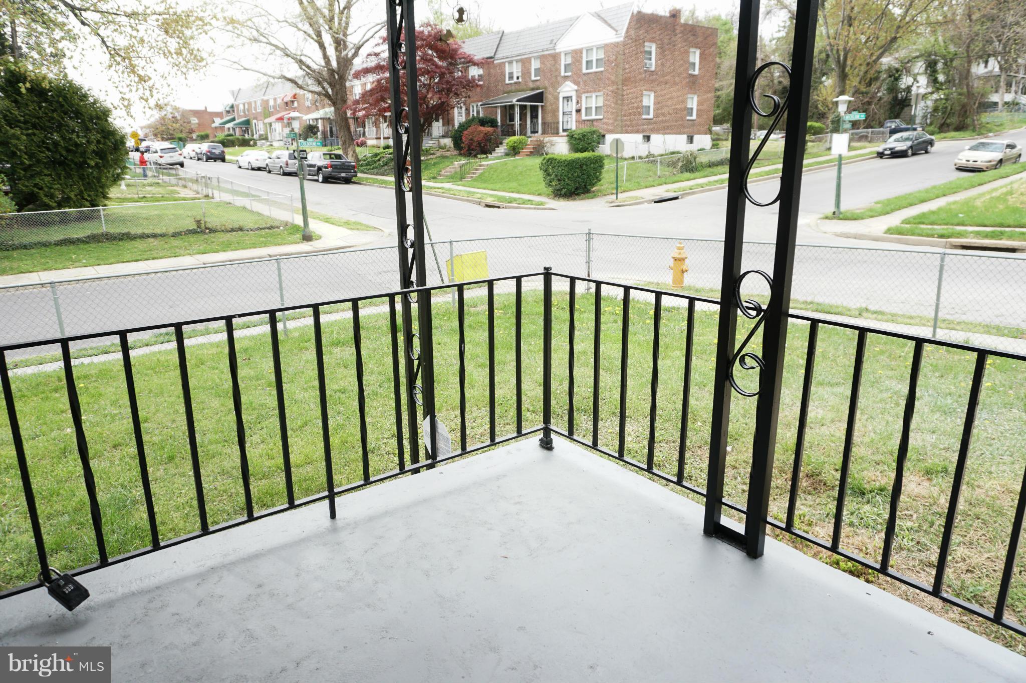 901 Wicklow Road Baltimore, MD 21229 - Photo 2 of 29 a view of a street view from a balcony