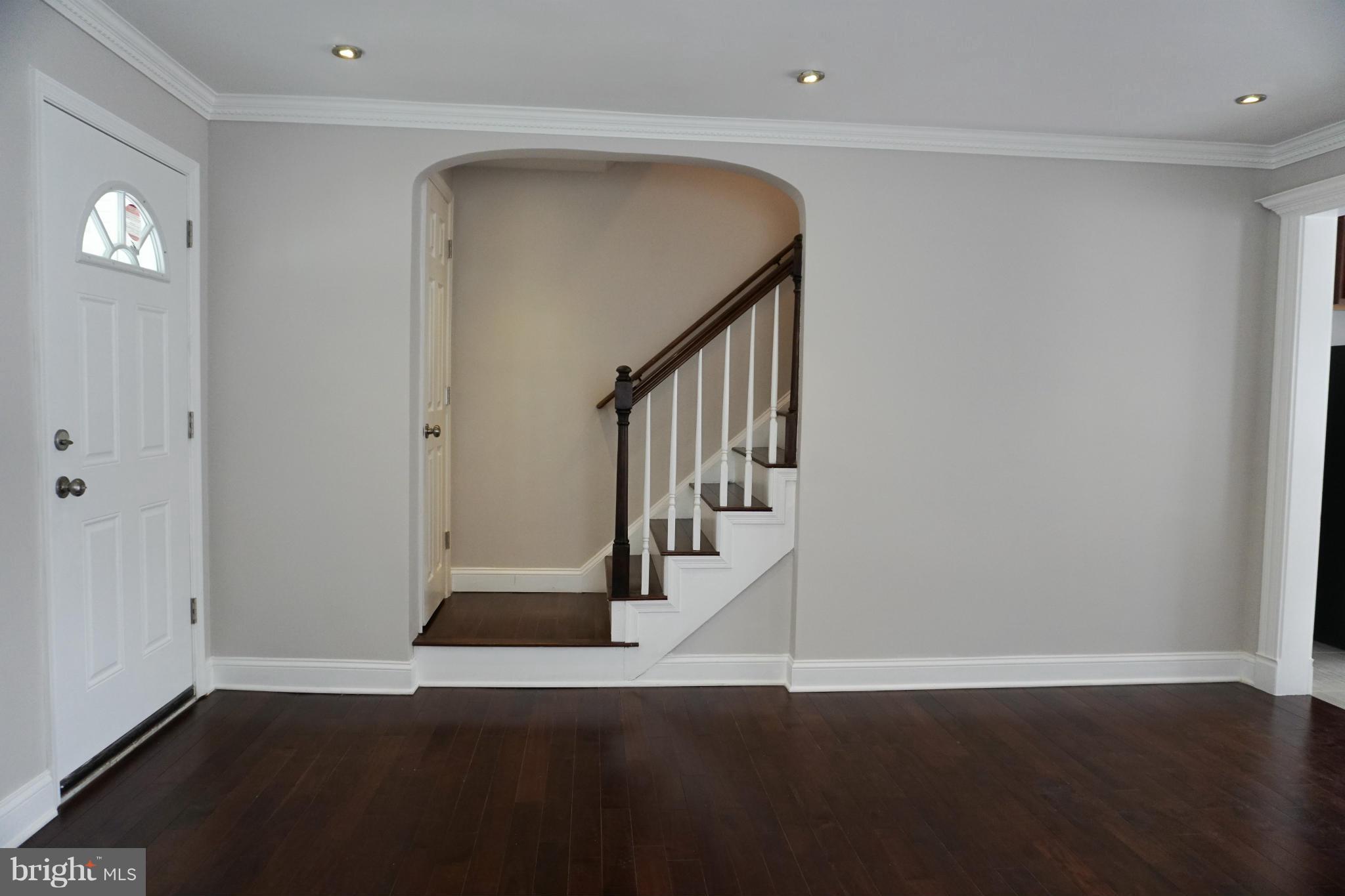 901 Wicklow Road Baltimore, MD 21229 - Photo 3 of 29 a view of entryway with wooden floor