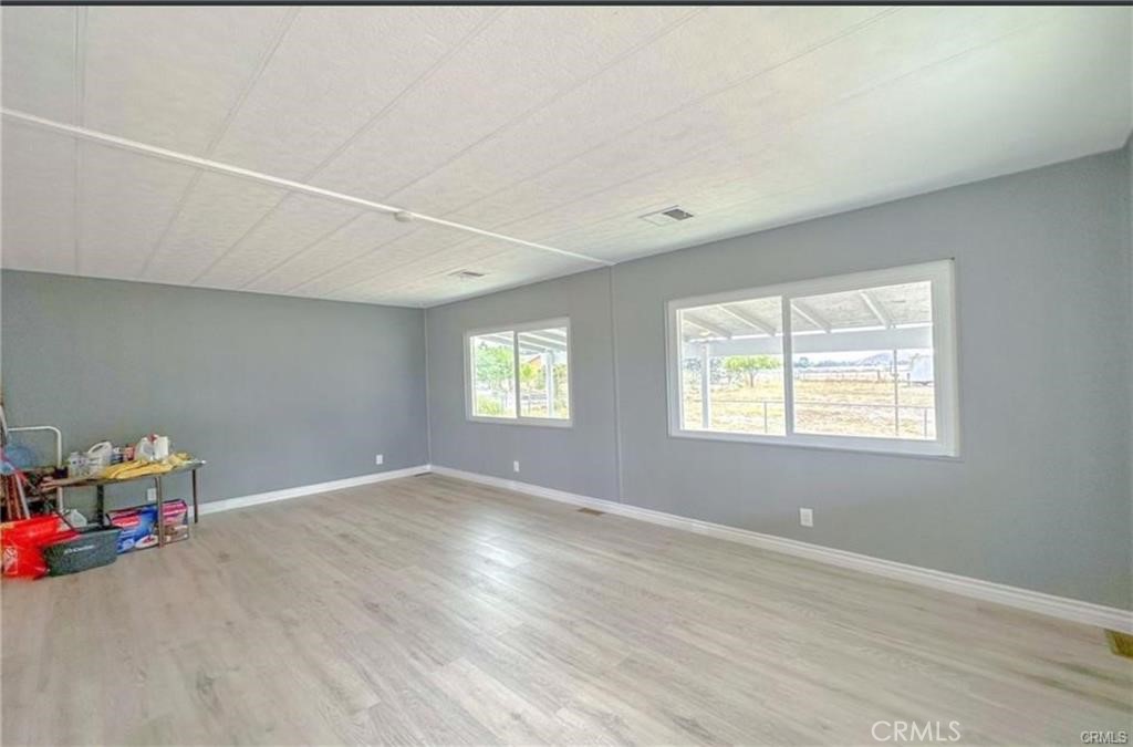 28160 Patterson Avenue Winchester, CA 92596 - Photo 15 of 57 an empty room with windows