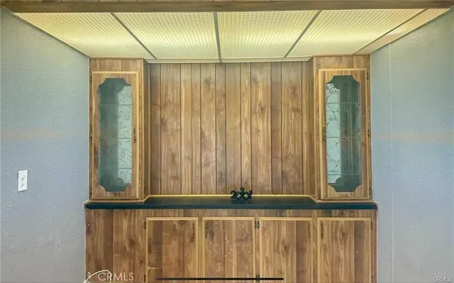 a view of a porch with wooden floor and outdoor space