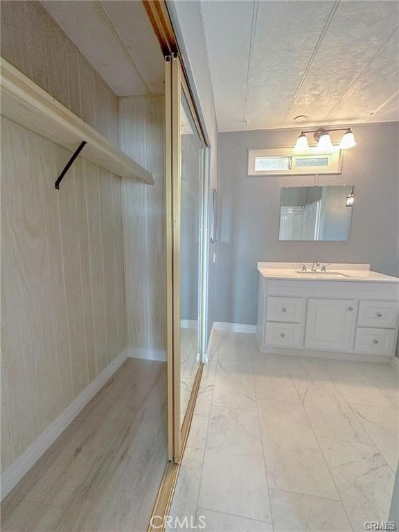 28160 Patterson Avenue Winchester, CA 92596 - Photo 30 of 57 a view of a hallway with closet and wooden floor