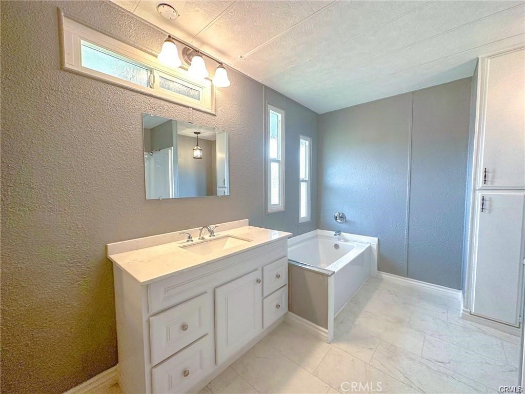 28160 Patterson Avenue Winchester, CA 92596 - Photo 34 of 57 a bathroom with a sink and a mirror